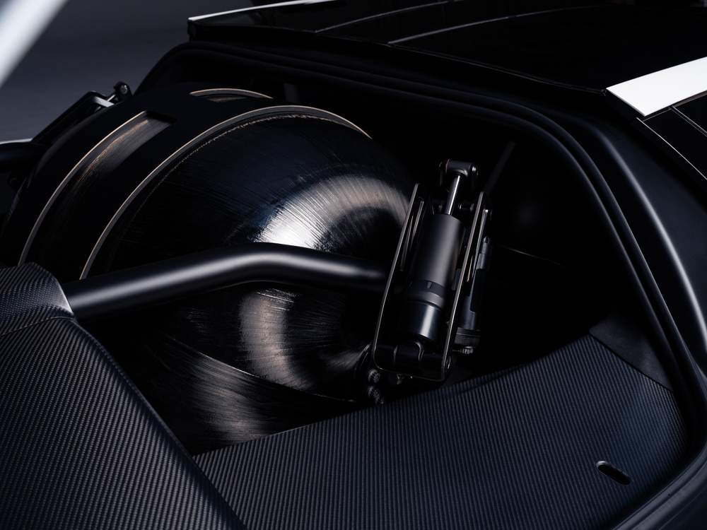 The carbon-fibre COPV tank mounted behind the Tesla Roadster's seats