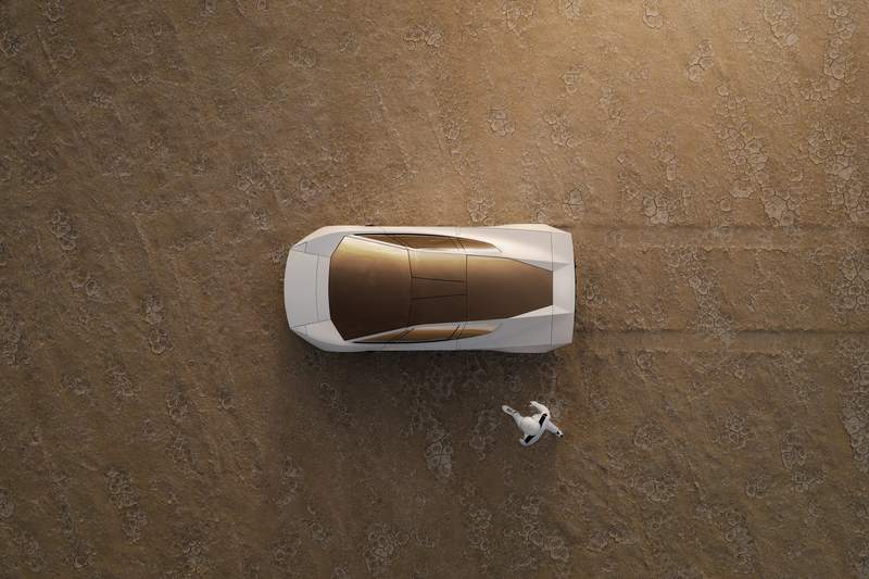 White Tesla Roadster seen from above on desert ground