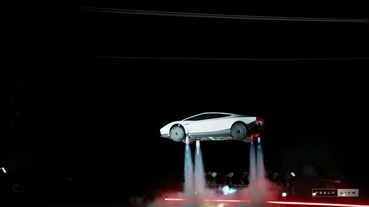 White Tesla Roadster in the air, held up by thruster jets during the demo in Tesla's livestream