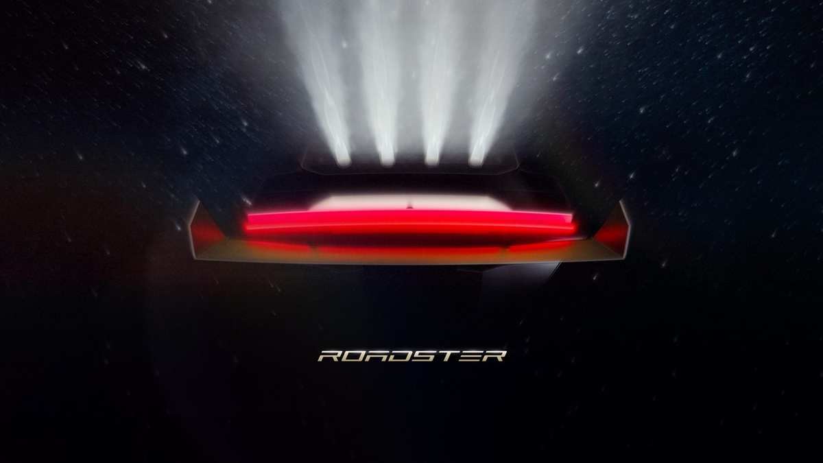 Official Tesla Roadster image: the rear of the car with a red light bar and four thruster jets pointing upward